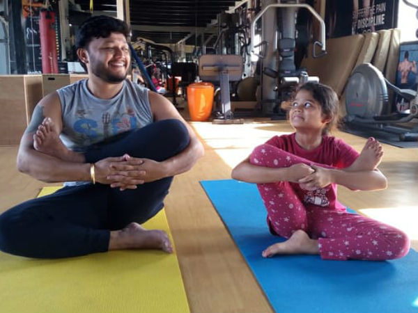 actor ganesh does yoga with his daughter charithriya actor ganesh does yoga with his daughter charithriya