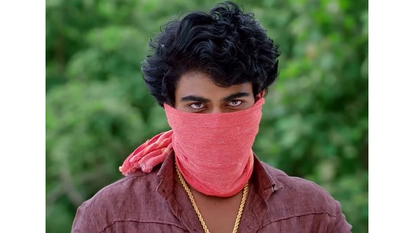 ಮುಸುಕು ಹಾಕಿಕೊಂಡು ಬರುವ ಕಂಠಿ